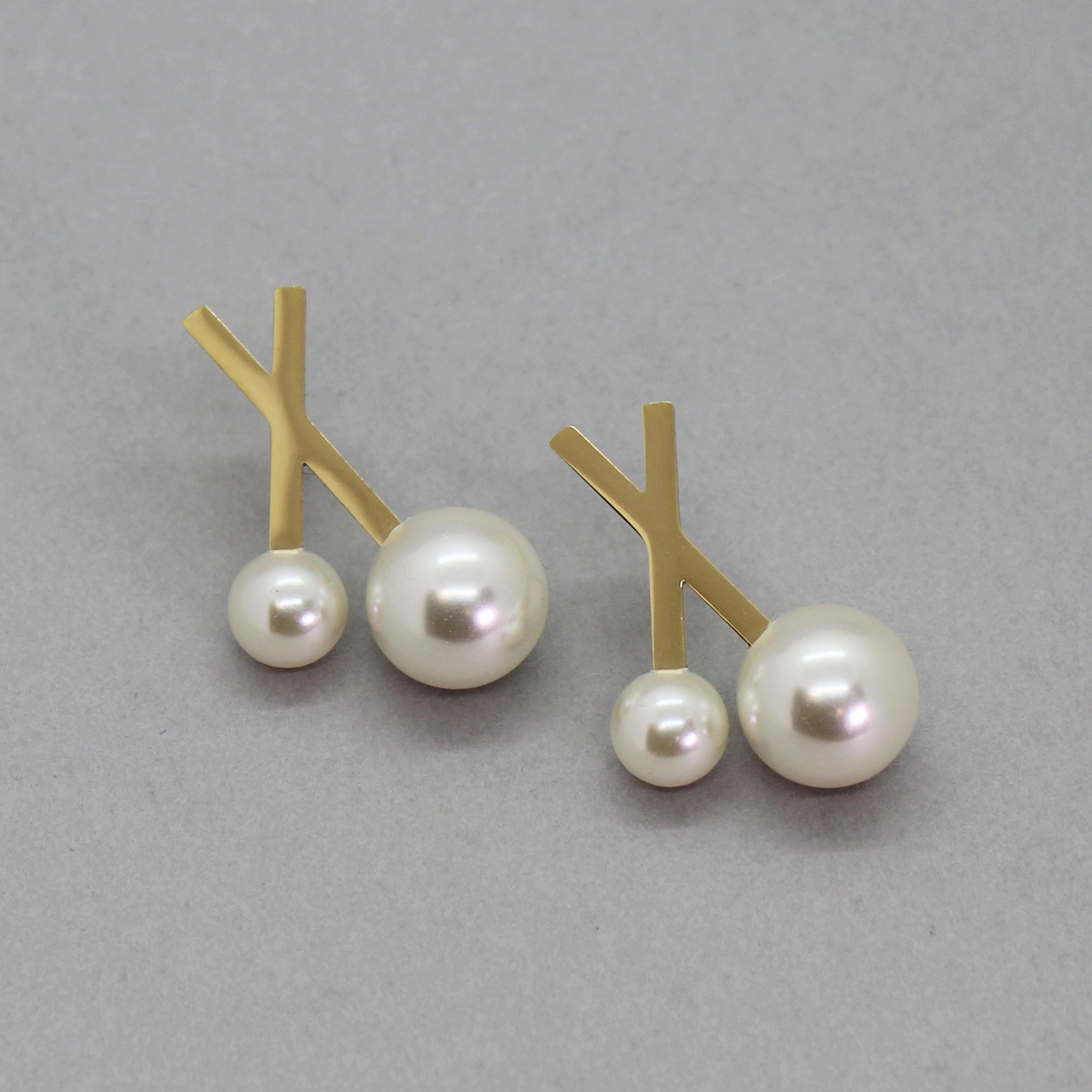 Pendientes gold en X con perlas