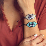 Brazalete de cordón y ojo tejido