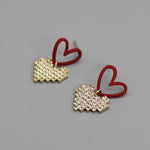 Pendientes corazones doble