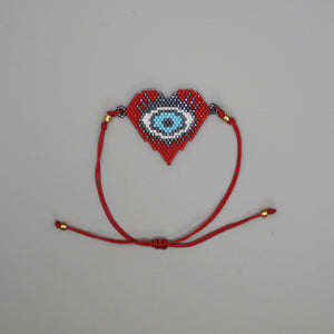 Brazalete tejido corazón lucky eye